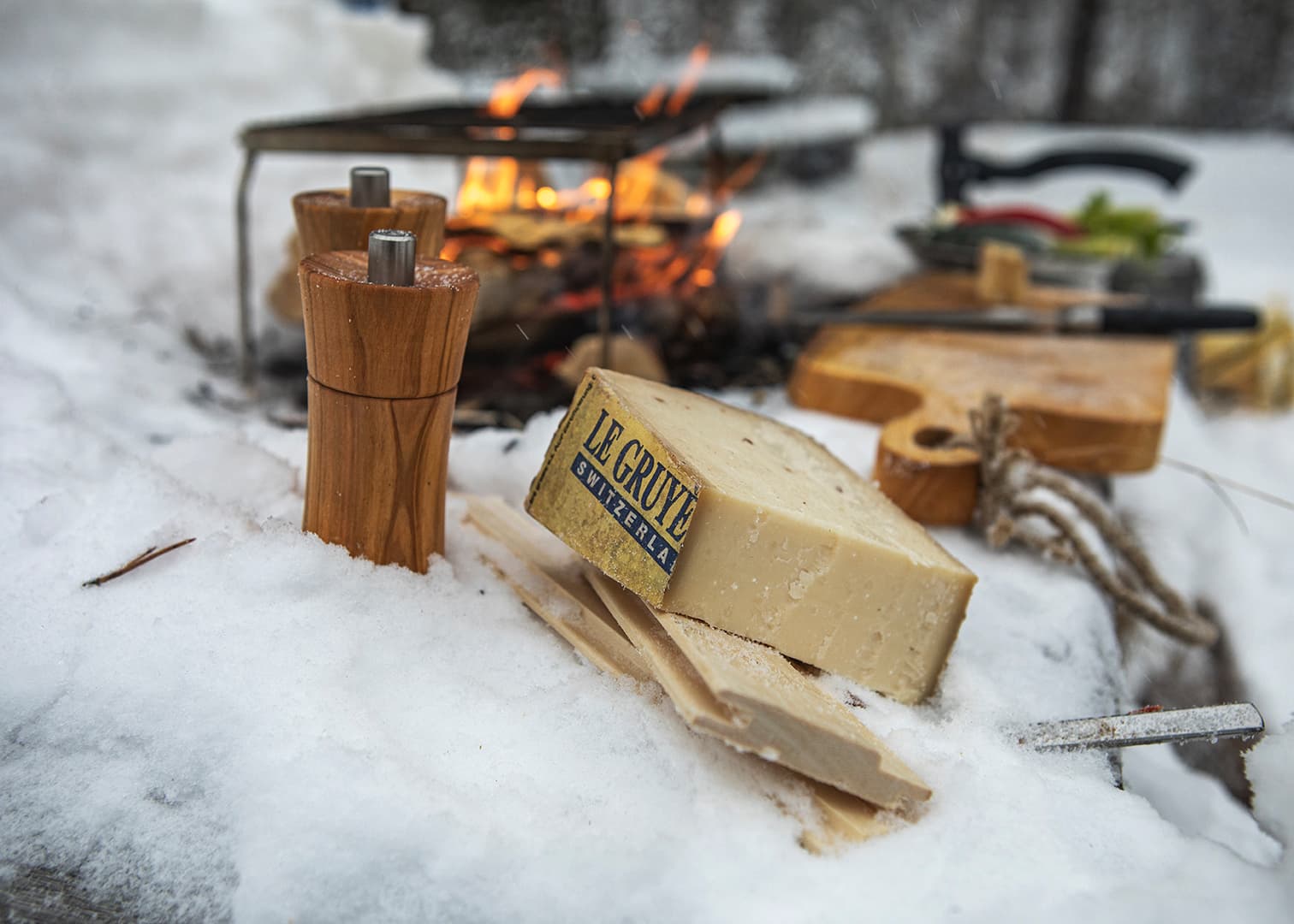 Le Gruyère AOP Cheese On Snow At a Campsite